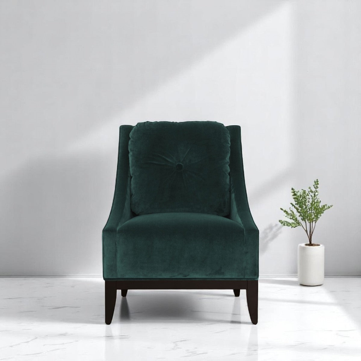 alt="Modern green lounge chair with square soft cushion and black wood legs in a cozy living space"