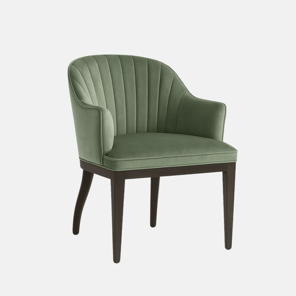 Modern armchair with green upholstered seat and backrest featuring vertical stitched panels, curved arms, and dark wooden legs.