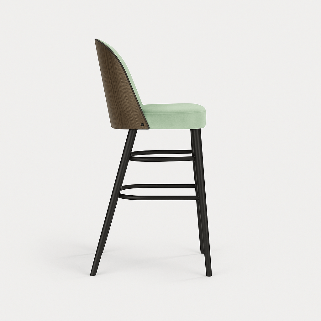 A barstool with pastel green velvet upholstery, black legs, and a dark wood veneer backrest, shown in a straight side profile view against a plain light background with a subtle shadow.