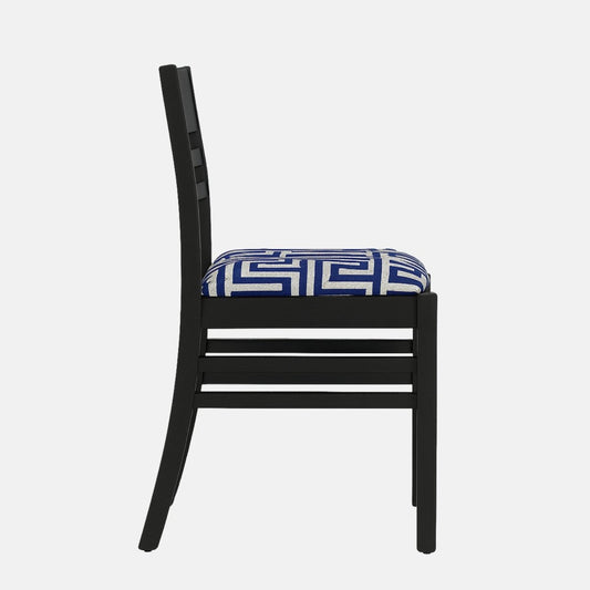 Modern dining chair with black wooden frame and blue geometric patterned upholstered seat on a white background