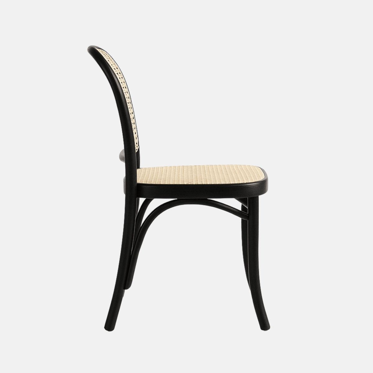 Black bentwood dining chair with natural rattan cane seat and backrest, side profile, modern classic design.