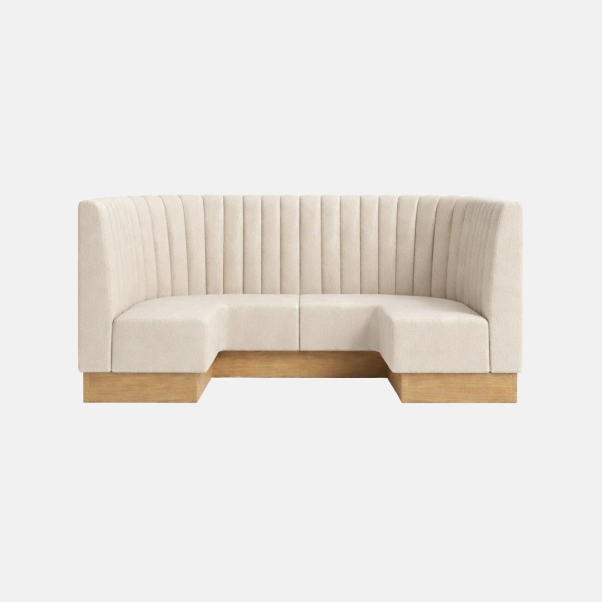 Curved banquette seating upholstered in cream fabric with vertical fluted detailing and a wooden plinth base, designed for stylish booth or restaurant interiors.