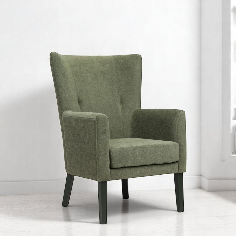 alt="Modern green lounge chair with wide backrest, black legs, and two button details for added elegance"