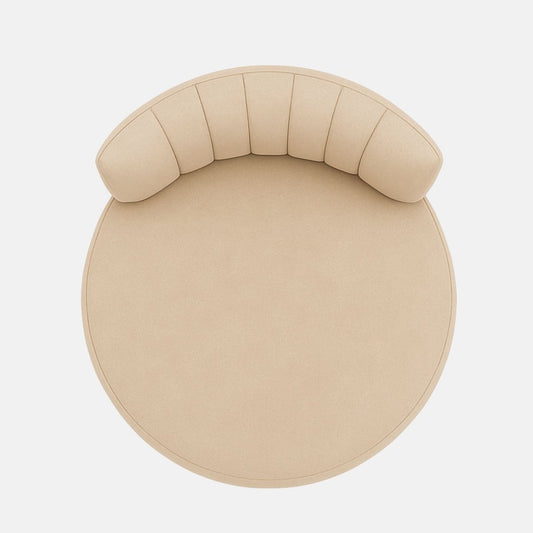 Beige velvet lounge chair with curved backrest and vertical channel stitching on dark wood base modern upholstered accent chair for living room, bedroom, or hotel suite.