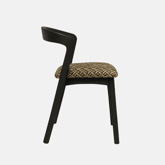 The Nina Stacking Dining Chair combines Scandinavian minimalist design with solid black oak and a patterned upholstered seat. This modern stackable dining chair is perfect for dining rooms, kitchens, cafés, or hospitality spaces, bringing Nordic and Japan style with lasting comfort and space-saving elegance