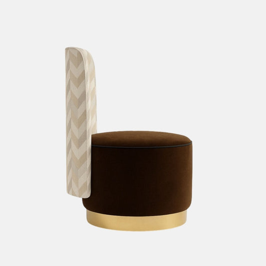 Contemporary accent chair with a tall beige chevron-patterned backrest, round dark brown upholstered seat, and a gold metallic base.