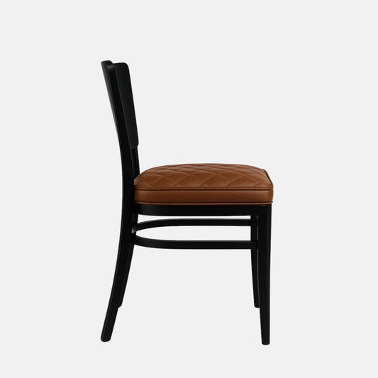 Classic dining chair with a black wooden frame and a quilted brown leather seat cushion, featuring a gently curved backrest and tapered legs, set against a light grey background