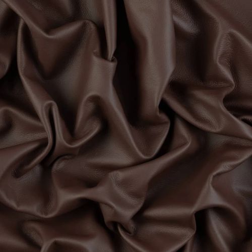 Brown leather upholstery material with soft folds and natural texture