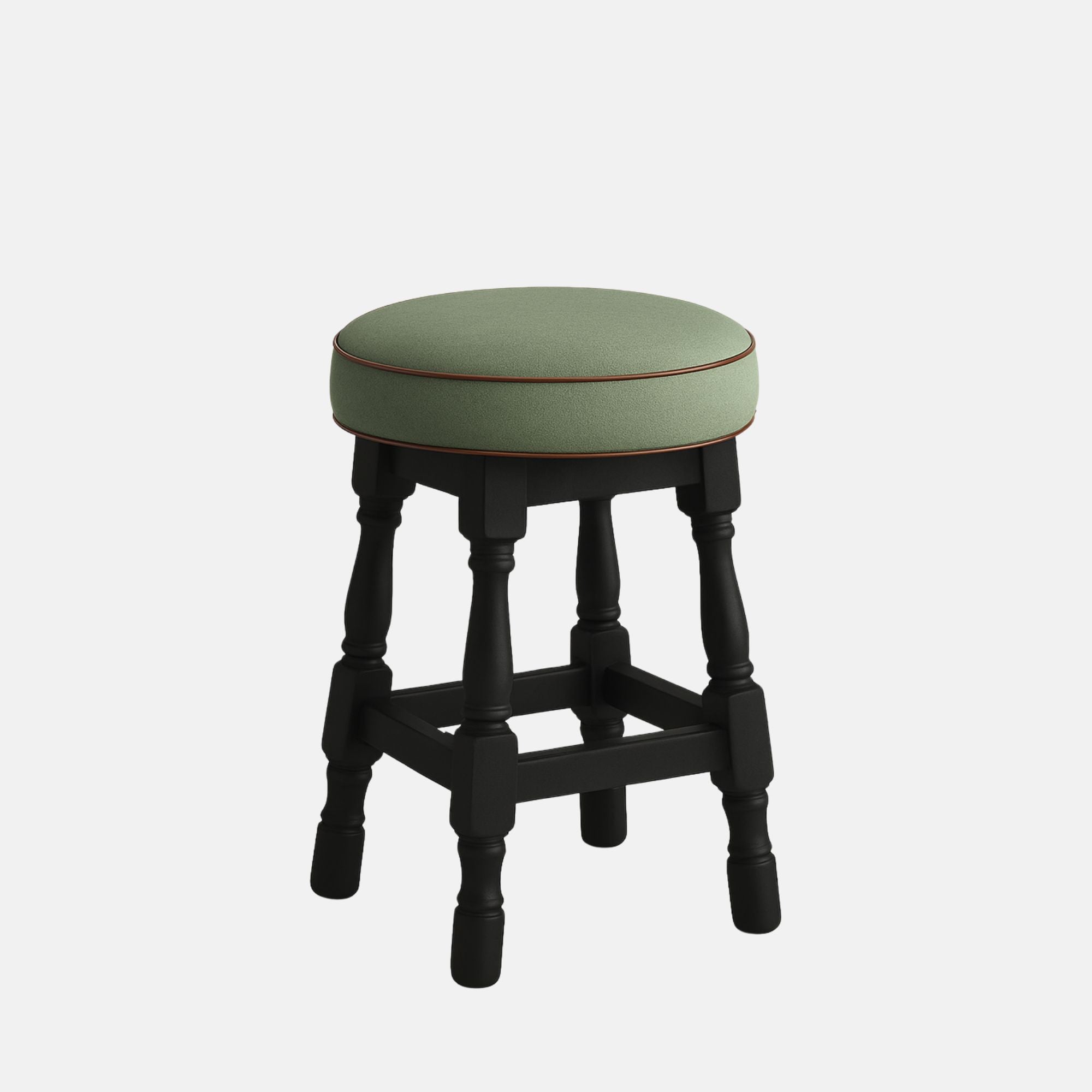 Tudor Low Stool by Lux Seat – compact round stool with a soft sage-green upholstered seat and dark black wooden legs featuring turned details, ideal for lounges, bars, and modern interiors