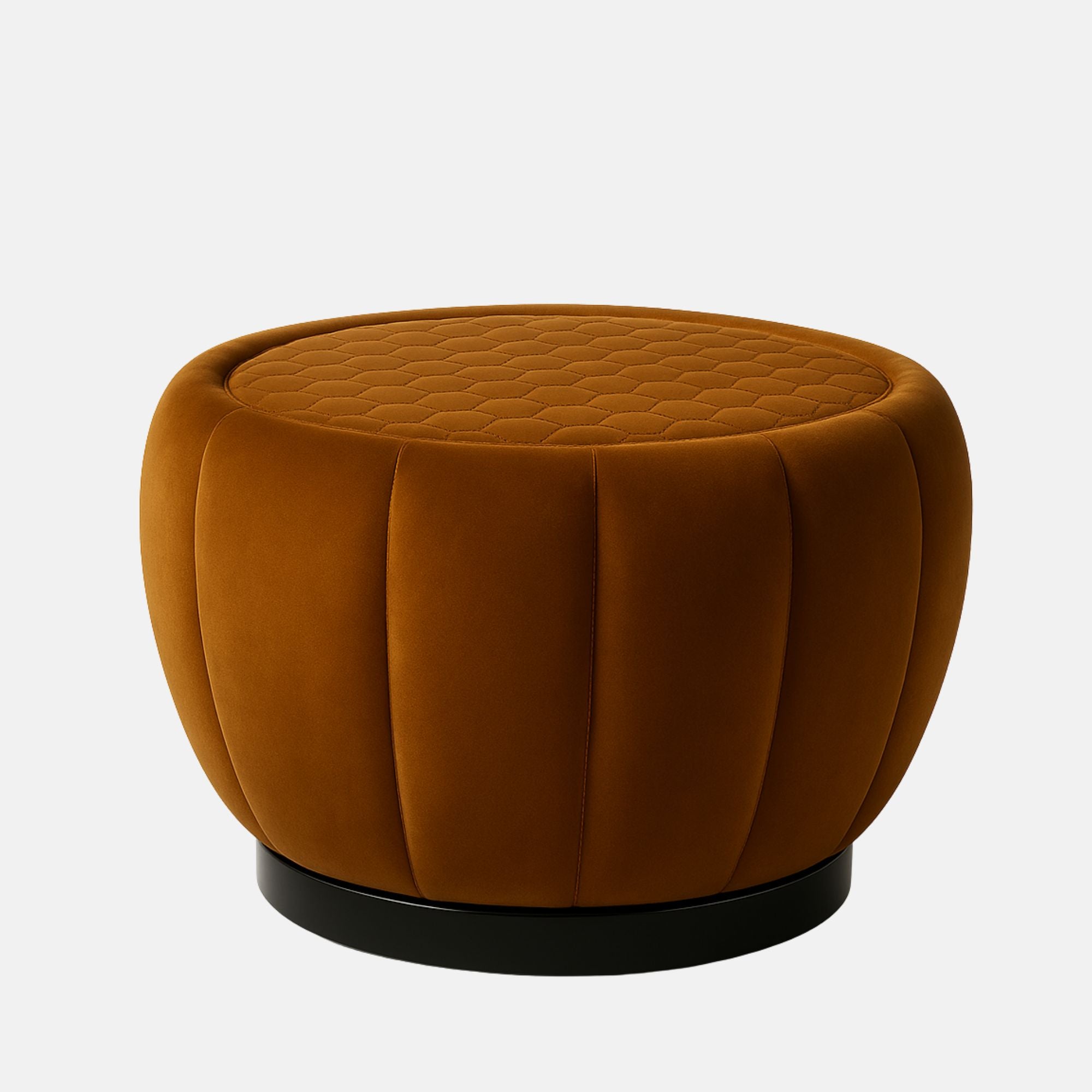 Rust velvet round ottoman with quilted top and vertical panel design on black base modern upholstered footstool or coffee table for living room or hotel lounge.