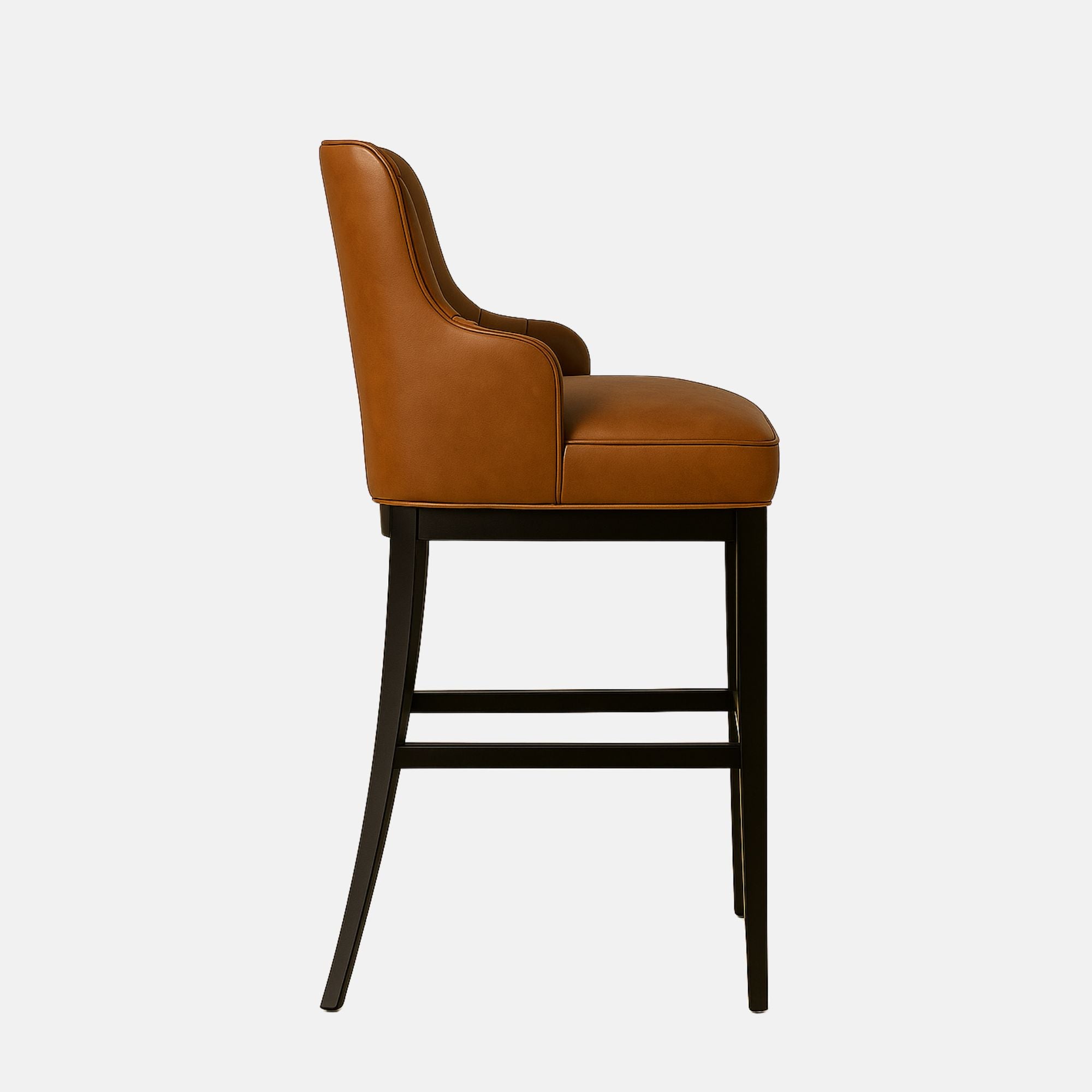 Brown leather bar stool with a curved, channel-tufted backrest, black tapered legs, and a gold metal footrest.
