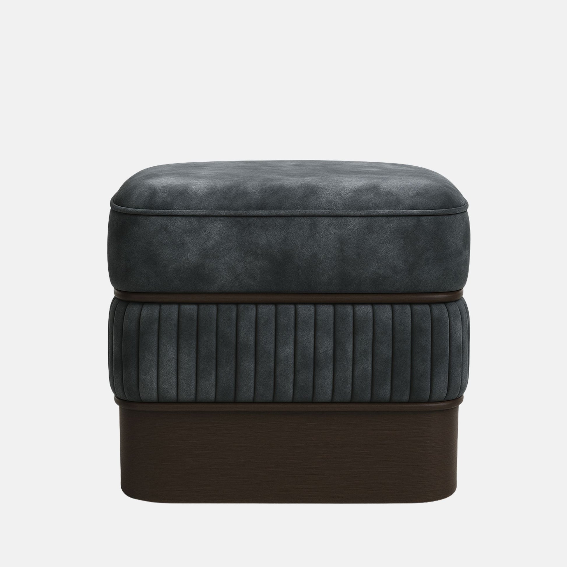Dark grey upholstered ottoman with ribbed lower panel and smooth cushioned top on wooden base modern square footstool for living room or hotel lounge.