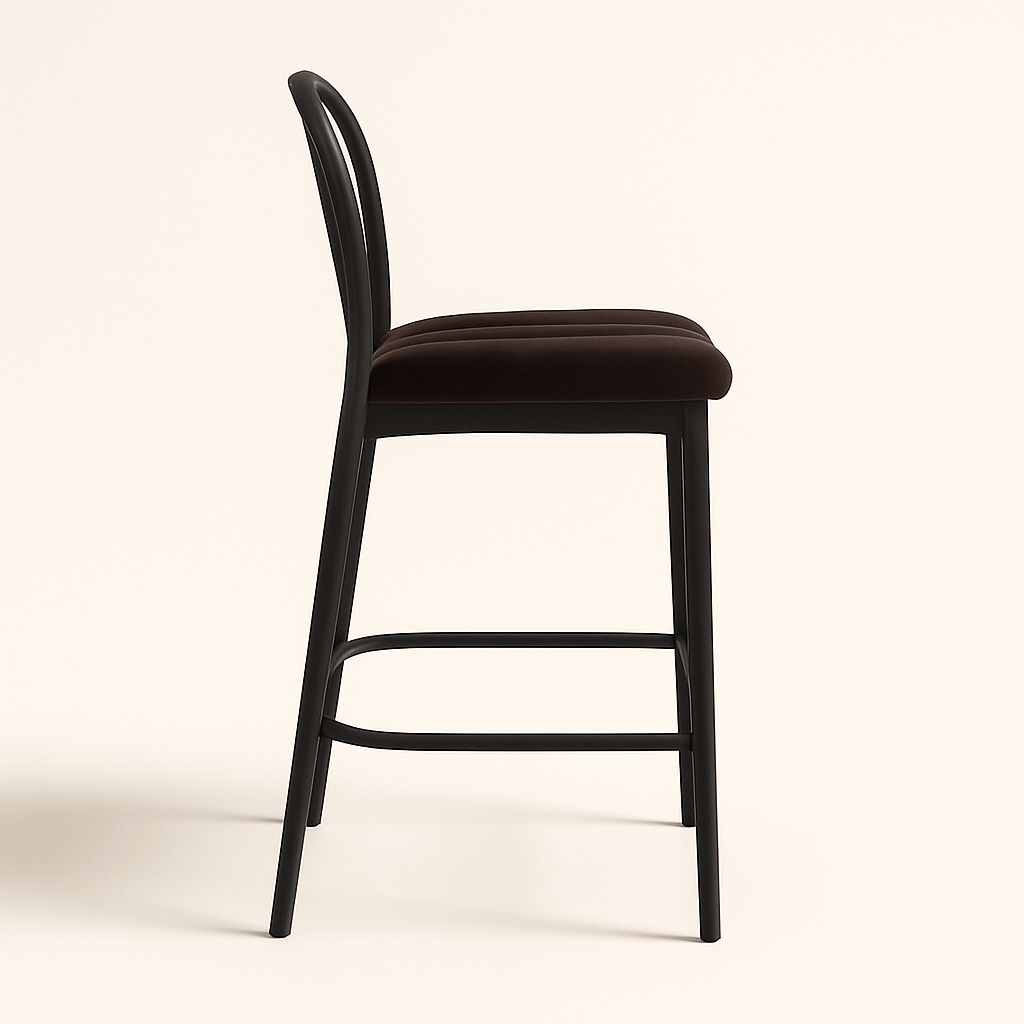 A modern bar stool featuring a matte black wooden frame with gently curved backrest slats, a sturdy metal footrest, and a plush dark chocolate brown velvet seat with vertical stripe stitching. The design combines elegance and comfort, suitable for contemporary kitchens or bars.
