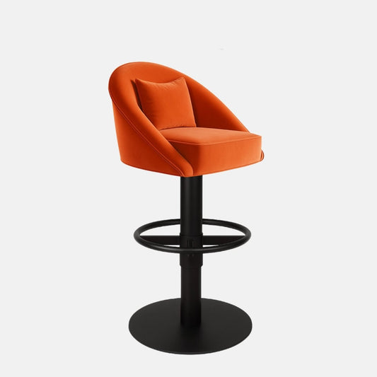 Bright orange upholstered bar stool with a curved backrest, matching cushion, black circular footrest, and round black metal base on a white background.