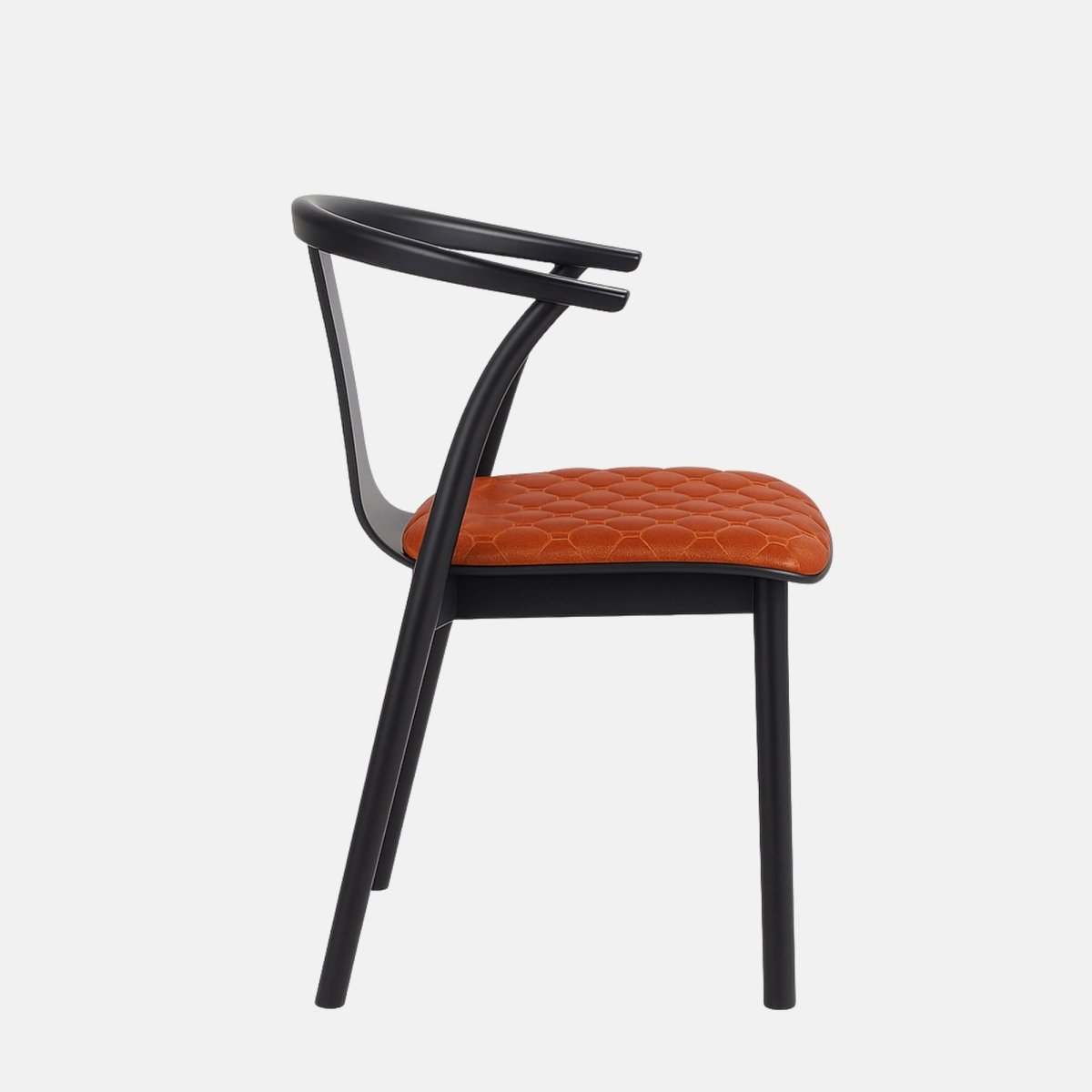 Modern dining chair with a curved black wooden frame and armrests, featuring a cognac brown leather seat with quilted stitching, set against a light grey background