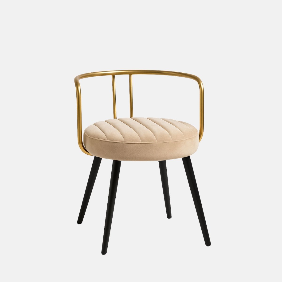 Modern dining chair with gold metal frame, cream upholstered round seat, and black tapered legs