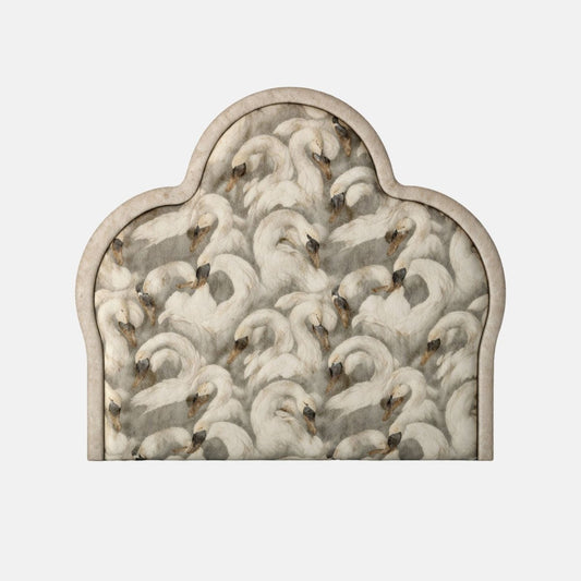 Upholstered arched headboard featuring a swan print pattern in soft neutral tones, with a smooth border and elegant curved shape.