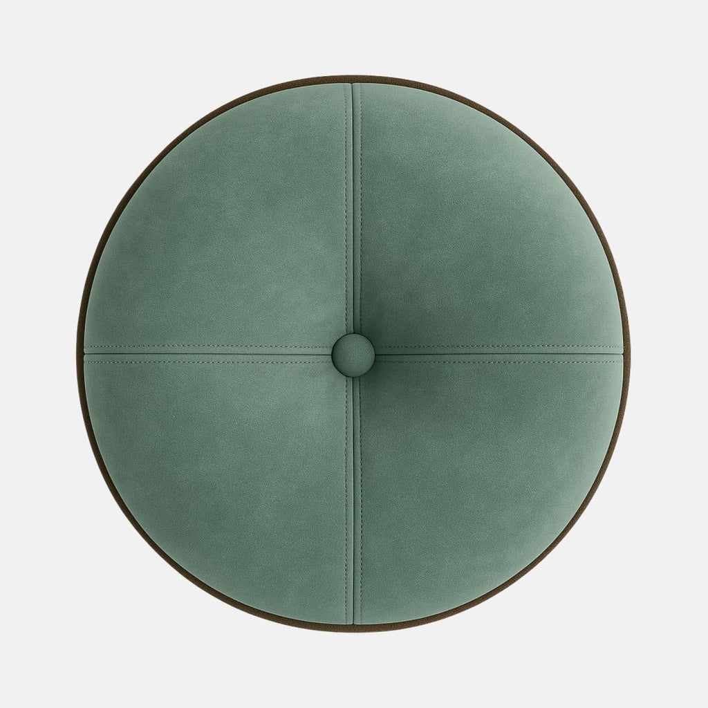 Mint green velvet round ottoman with button-tufted top and dark wood base modern upholstered footstool or accent seat for living room, bedroom, or hotel interior.