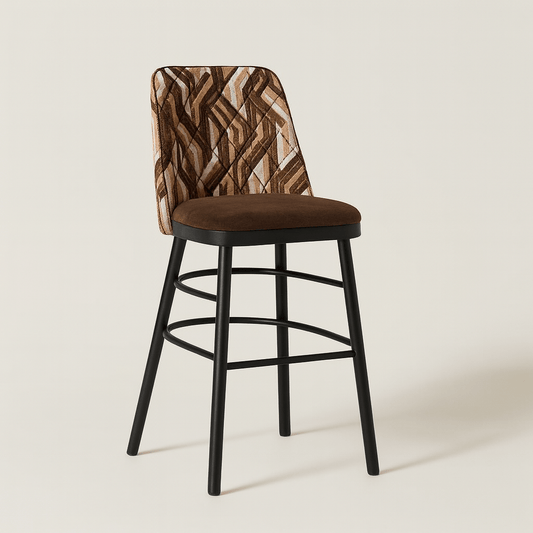 A modern bar stool featuring a geometric patterned fabric backrest with diamond stitching, a chocolate brown velvet seat, and sleek black legs with curved metal footrests, set against a plain off-white background.