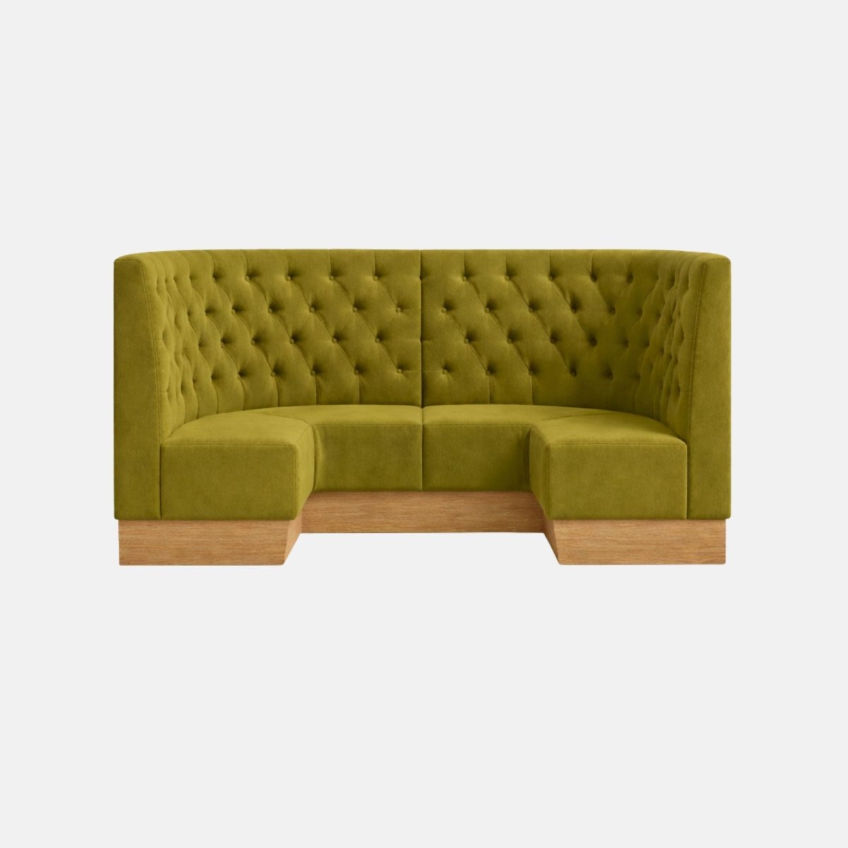 Upholstered green banquette seating with button tufting and corner design, featuring a wooden base and compact booth-style layout on a neutral background.