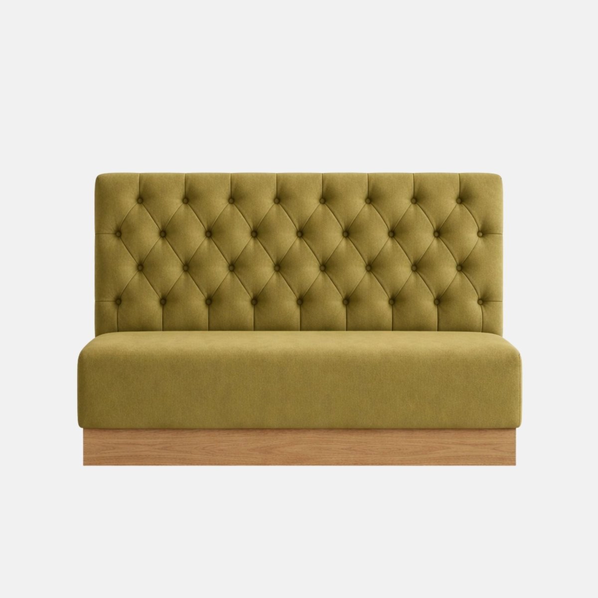 Upholstered banquette bench in green fabric with button tufted backrest and wooden base, designed for booth-style seating on a neutral background.