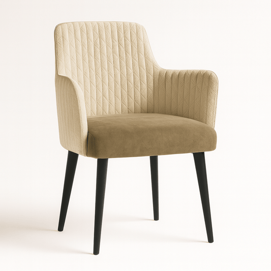 A modern upholstered armchair with a diamond-quilted cream fabric on the backrest and armrests, a smooth taupe suede-like seat cushion, and four sleek black tapered wooden legs, combining elegance with contemporary design.