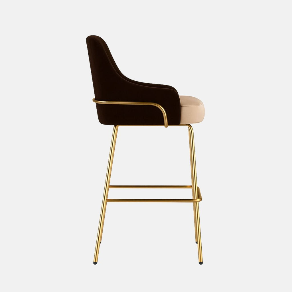 Modern upholstered bar stool with dark brown curved backrest, beige cushioned seat, and slim gold metal legs with footrest
