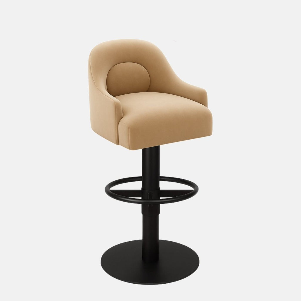 Modern beige upholstered bar stool with curved backrest, circular footrest, and black pedestal base.