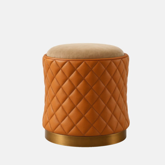 Tan quilted leather and beige velvet round stool with brass base modern upholstered ottoman or vanity seat for living room, bedroom, or hotel interiors.