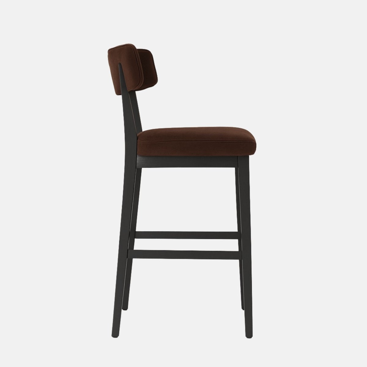 Modern bar stool with dark brown upholstered seat and low backrest featuring vertical stitching, supported by black wooden legs with footrests.