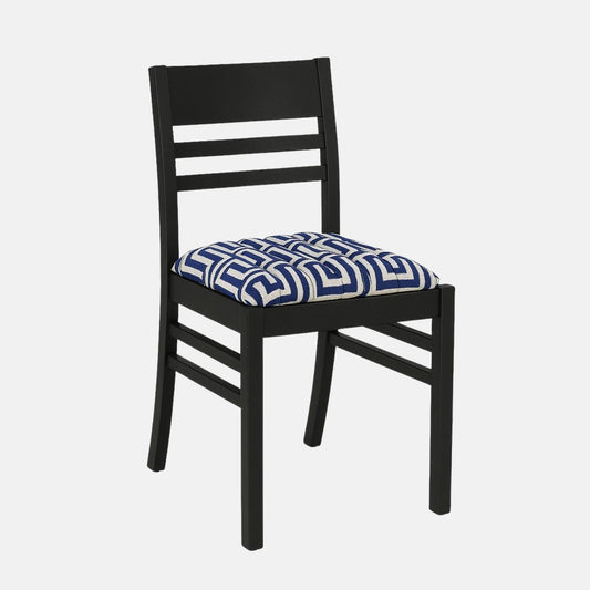 Modern dining chair with black wooden frame and blue geometric patterned upholstered seat on a white background
