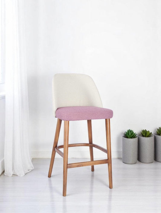 alt="Stylish kitchen stool with padded seat, curved backrest, and medium oak wooden legs"