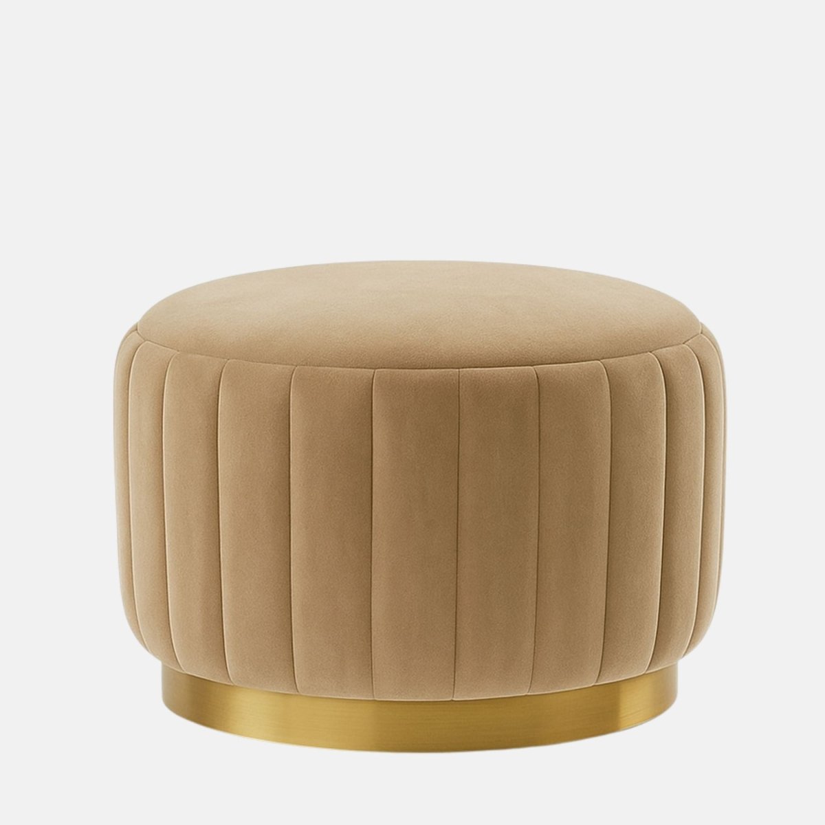 Beige velvet round ottoman with vertical panel design and brushed brass base modern upholstered stool or coffee table for living room, bedroom, or hotel lounge.
