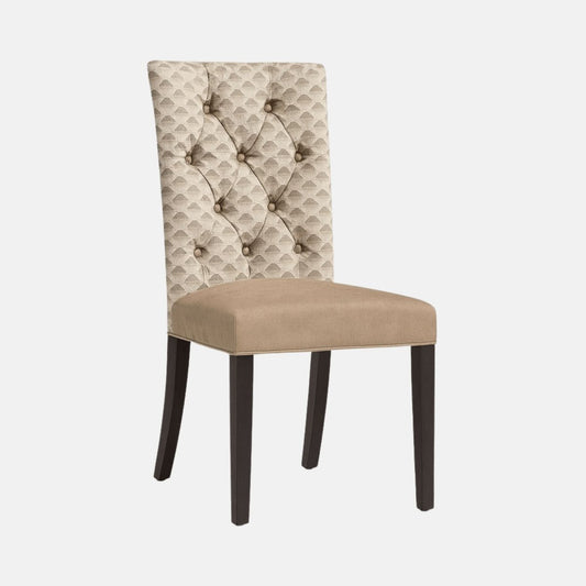 Elegant upholstered dining chair with beige patterned tufted backrest, soft tan seat cushion, and dark wooden legs, ideal for dining rooms or restaurants.
