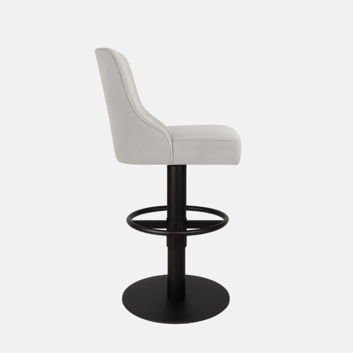 Side view of a light grey upholstered swivel counter stool with curved backrest, black pedestal base, circular footrest ring and round base on a white background.
