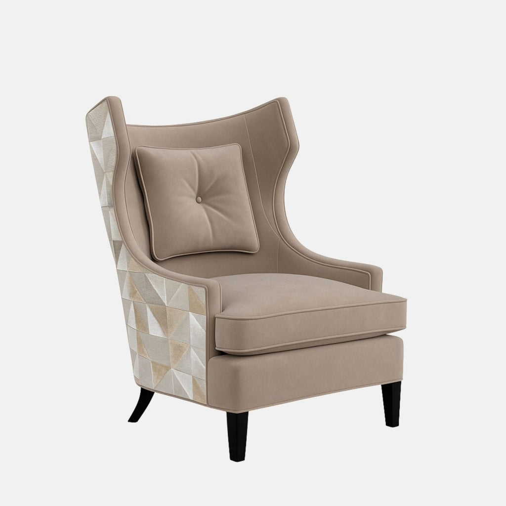 Beige modern wingback armchair with a button-tufted cushion, curved sides, black legs, and a geometric patterned fabric on the outer back
