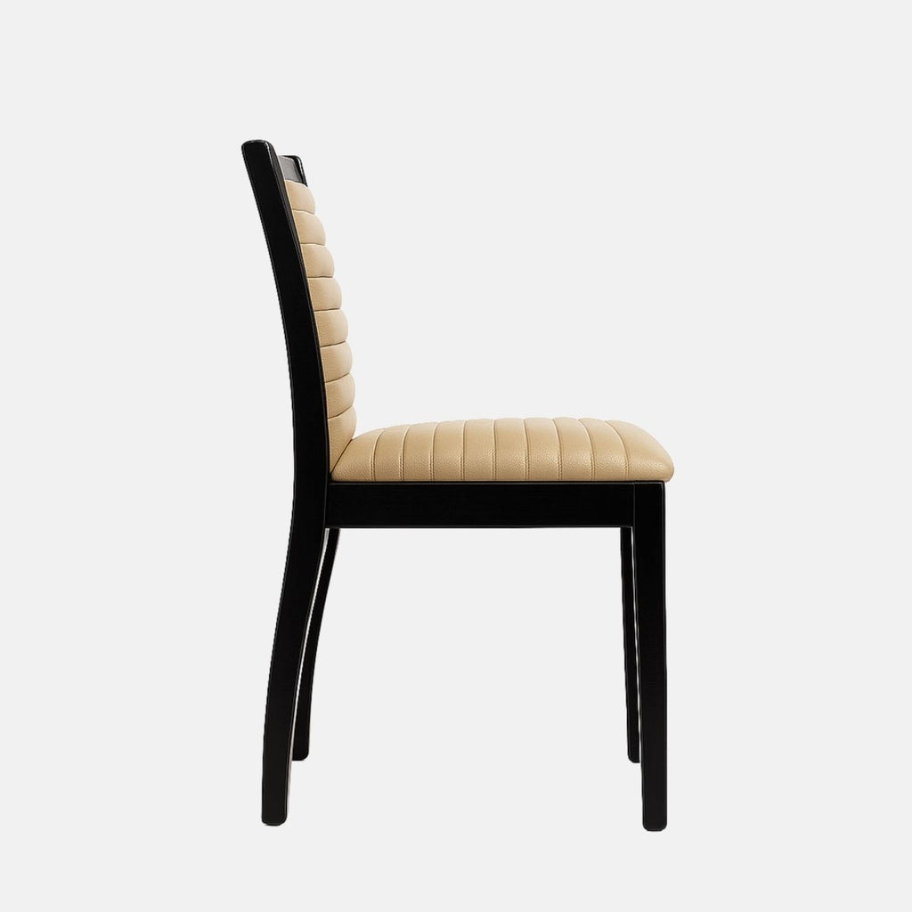 Elegant dining chair with a black wooden frame and legs, featuring beige leather upholstery with horizontal channel stitching on the seat and backrest, set against a light grey background
