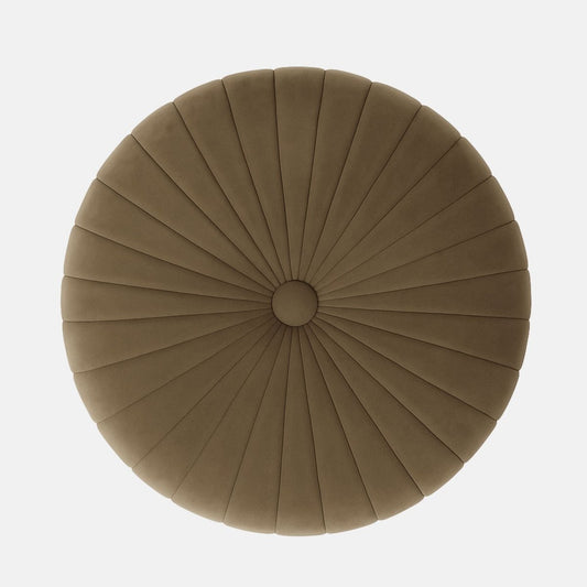 Taupe velvet round ottoman with vertical channel upholstery and natural wood base modern upholstered stool or side table for living room, bedroom, or hotel lounge.