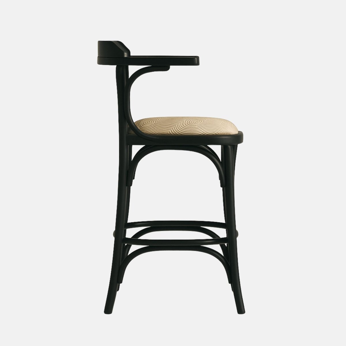 Classic bar stool with black wooden frame, curved arms and backrest, patterned beige upholstered seat, and circular footrest support.