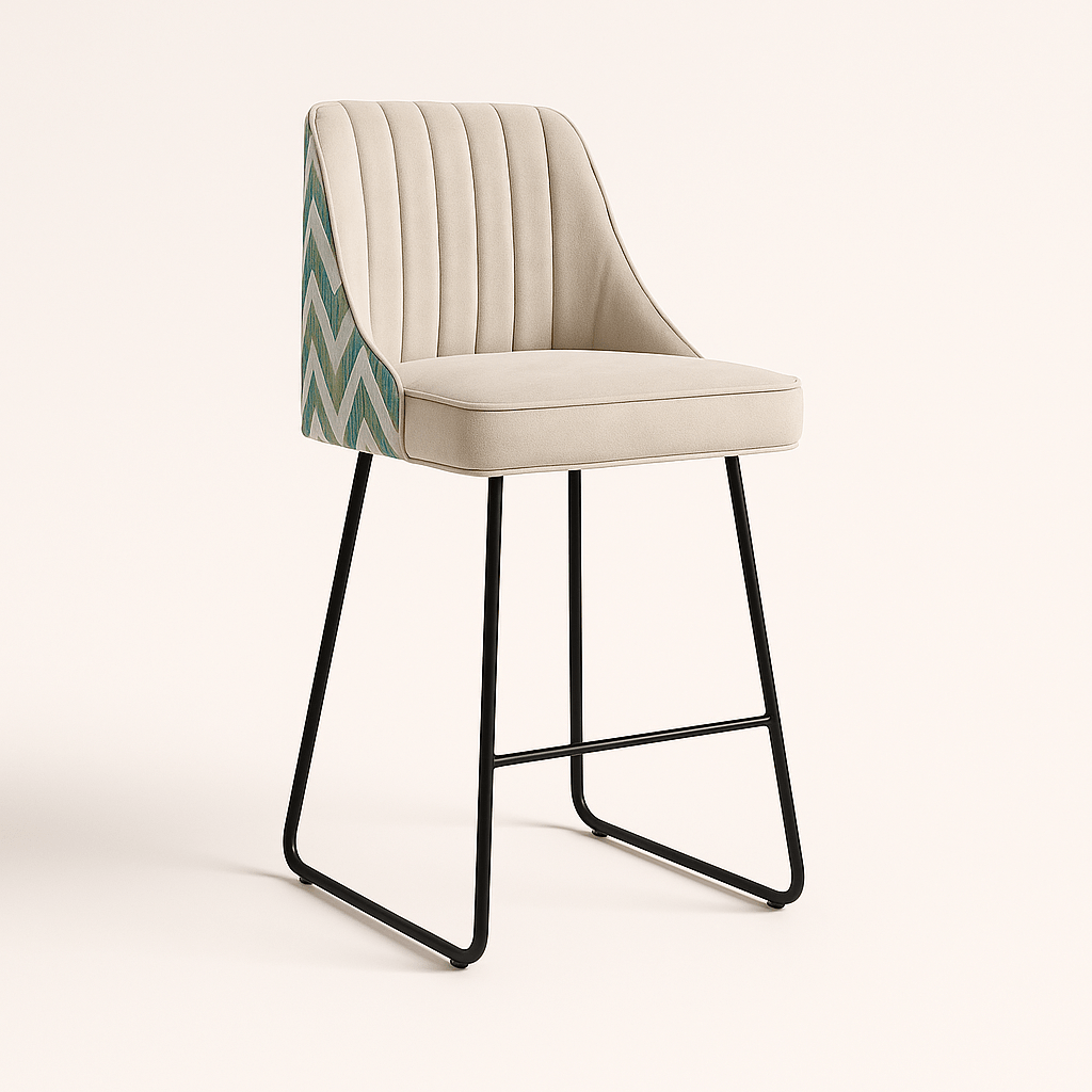 Modern bar and kitchen counter stool with a cream upholstered seat and vertical channel tufting, featuring a chevron-patterned fabric on the back and a sleek black metal sled base, set against a neutral background.
