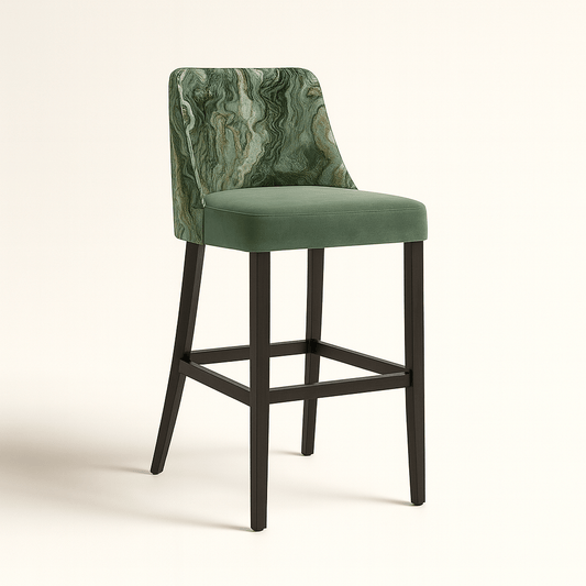 A modern barstool with a green marble-patterned fabric backrest and a plush sage green velvet seat, supported by sleek dark wooden legs with crossbars, viewed from the side against a light beige background.
