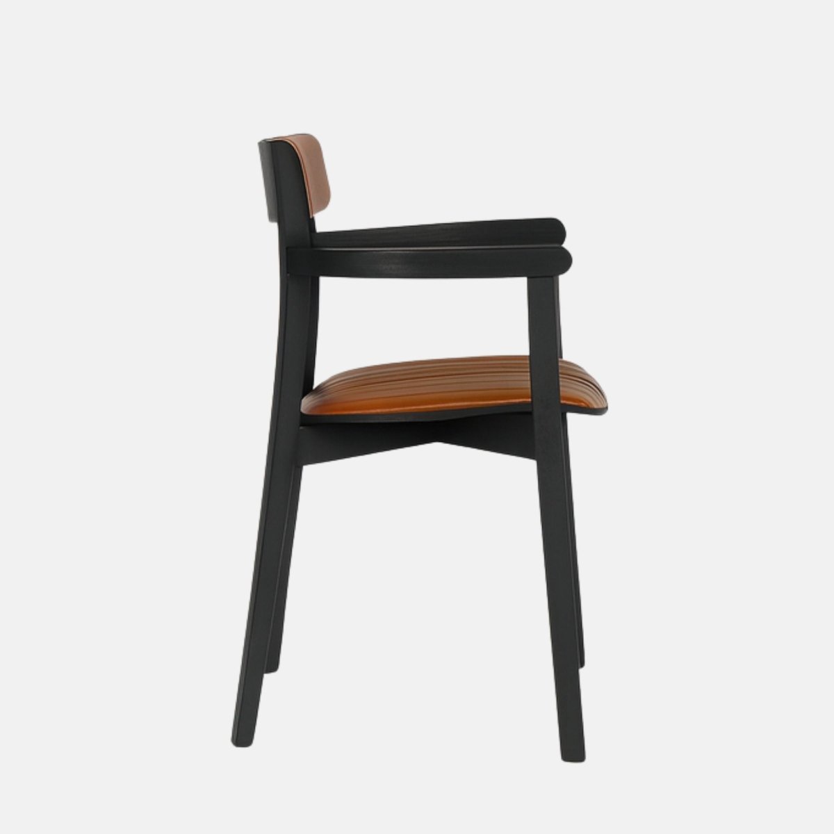 Modern armchair with a slim black wooden frame and armrests, featuring caramel brown leather upholstery on the seat and rounded backrest with vertical stitching, set against a light grey background