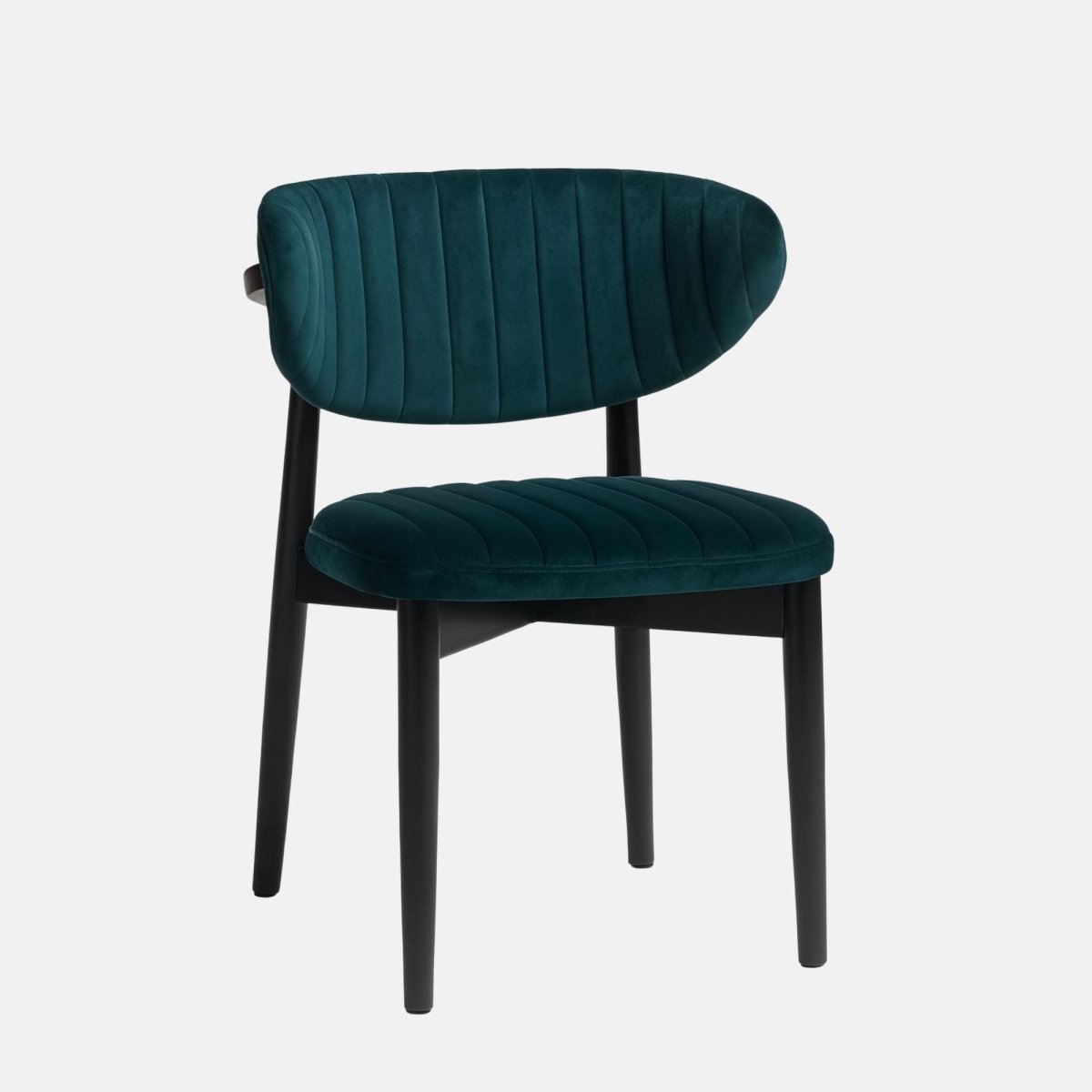 Modern dining chair with a black wooden frame and legs, featuring deep teal velvet upholstery on the curved backrest and seat with vertical channel stitching, set against a light grey background