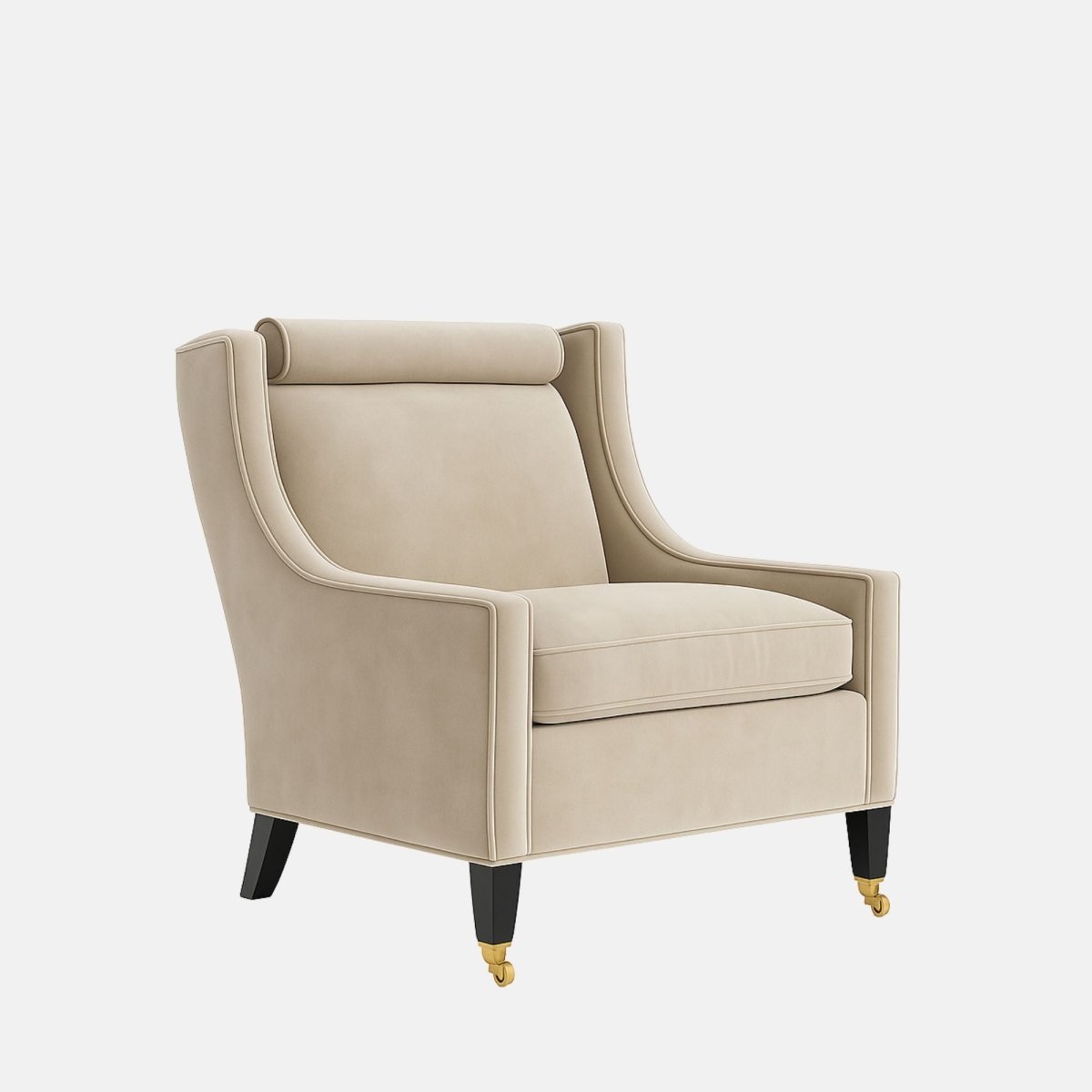 Beige upholstered armchair with curved sides, a cylindrical headrest, a cushioned seat, black legs, and brass front castors.