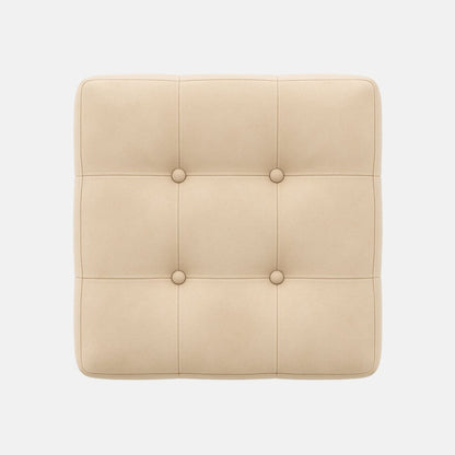 Square beige ottoman with tufted upholstery and button detailing on all sides