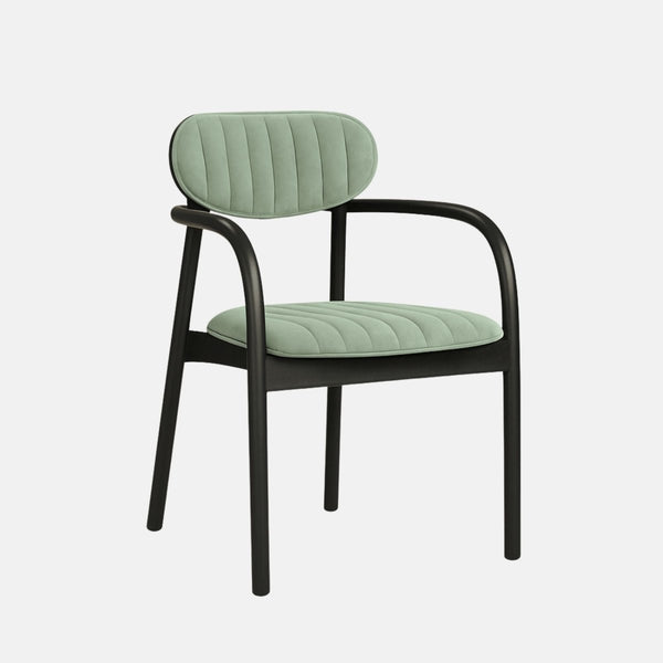Modern dining chair with oval green upholstered backrest, matching cushioned seat with vertical stitching, and sleek black wooden frame with curved armrests.