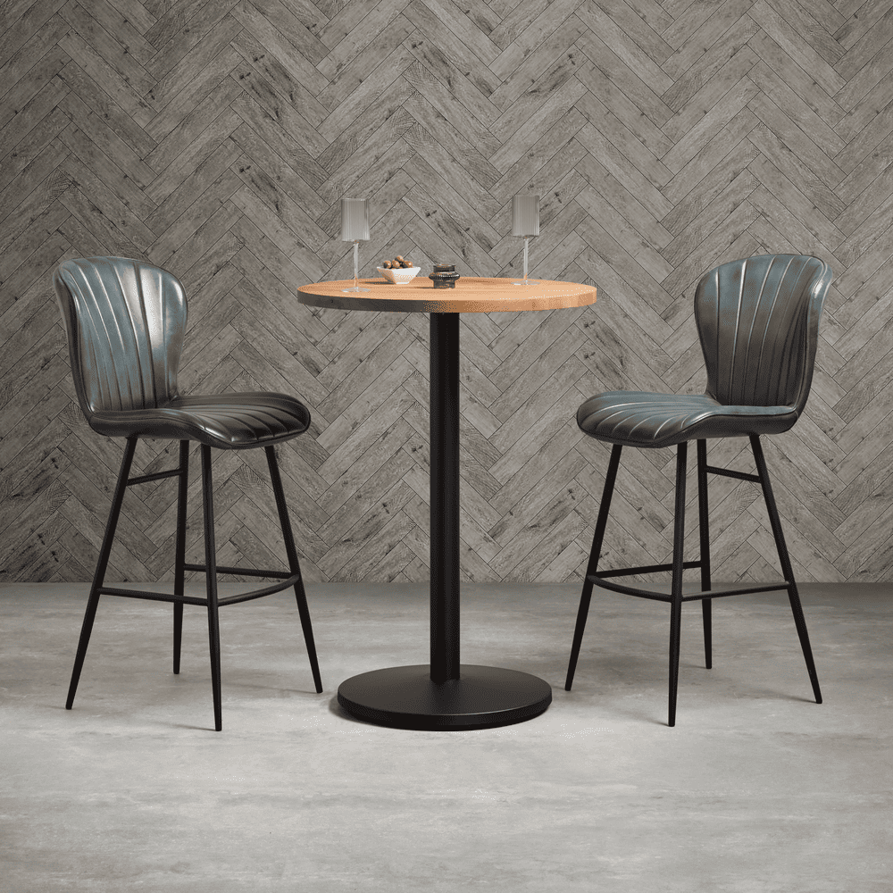 alt="Comfortable grey leather bar stools with durable metal base and refined finish"