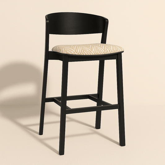 Modern bar and kitchen counter stool with a black wooden frame and a cushioned beige patterned seat, featuring a curved low backrest and clean contemporary lines, set against a neutral background.