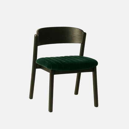 Black wood dining chair with a deep green upholstered seat and curved backrest, modern minimalist design
