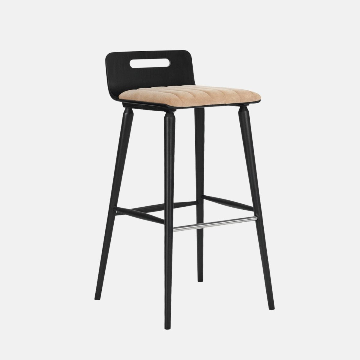 Modern bar stool with a black wooden frame, low backrest featuring an oval cutout, beige upholstered seat, and metal footrest.